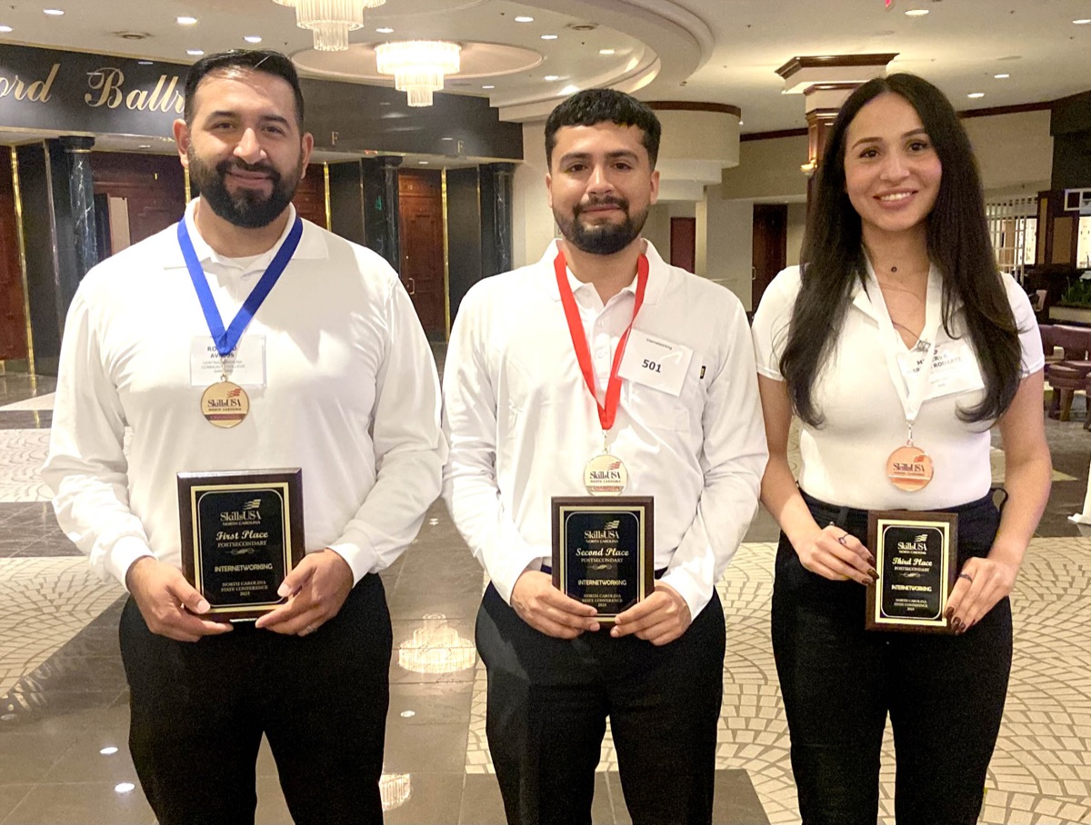 Click to enlarge,  Rosalio Avalos, Ernesto Jimenez Flores, and Minerva Martos Rodarte finished first, second and third, respectively, in the North Carolina SkillsUSA championships in the Internetworking category. 