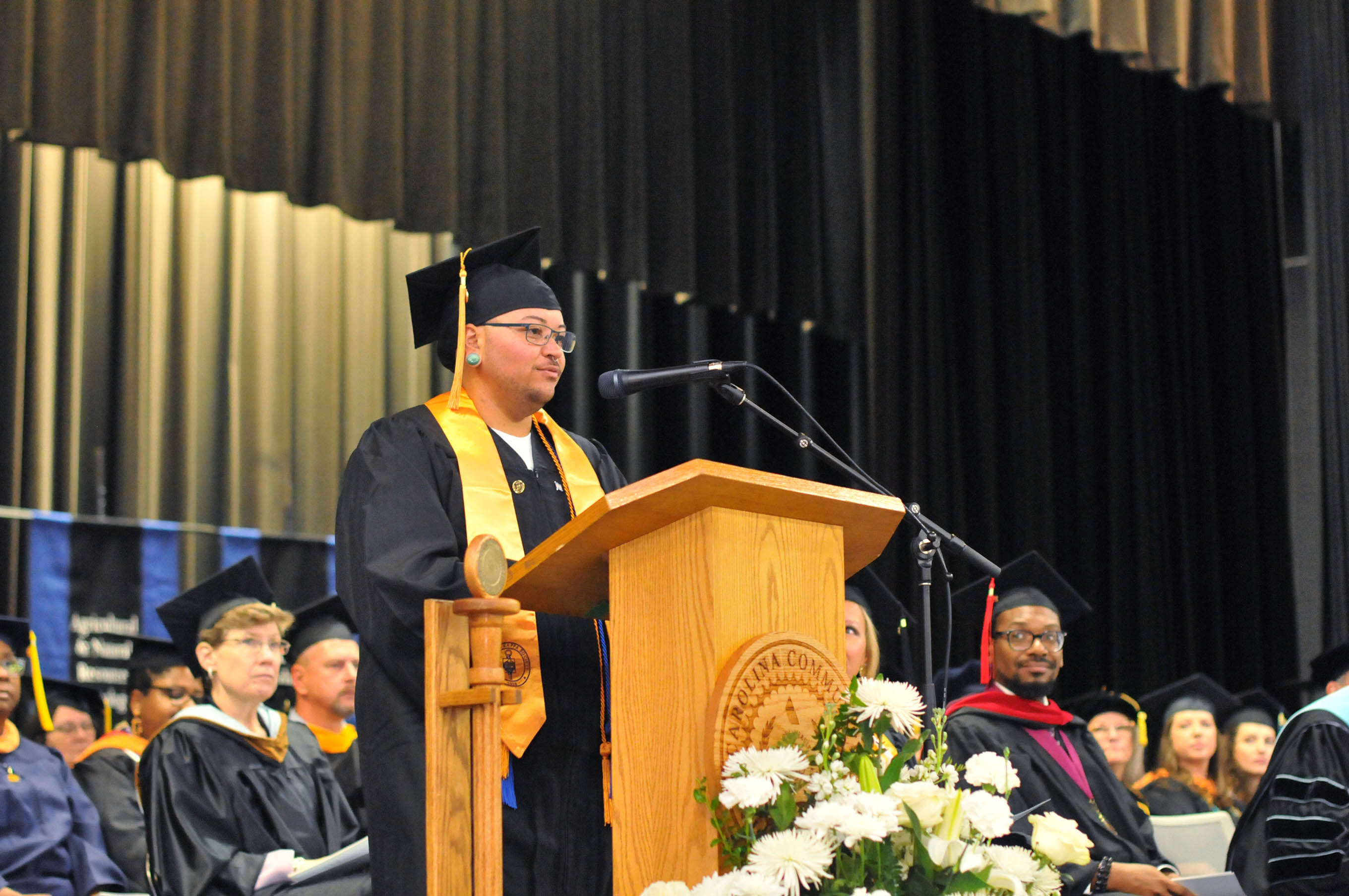 Click to enlarge,  Alexander Williams was one of the student speakers at the Central Carolina Community College summer graduation on Aug. 7 at the Dennis A. Wicker Civic &amp; Conference Center in Sanford. 