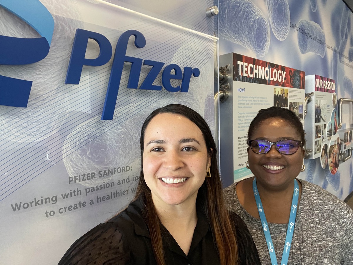Click to enlarge,  Dr. Brenda Grubb (right) is pictured with Pfizer's Paola Adame. 