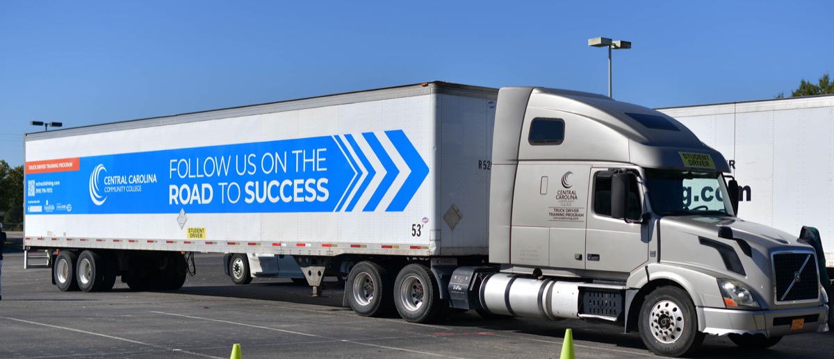 Click to enlarge,  The Central Carolina Community College commercial truck driving course is part of a program that serves as a regional workforce solution to the demand for commercial truck drivers in the combined service areas of Chatham, Harnett, Hoke, Lee, Moore, and Randolph counties. 