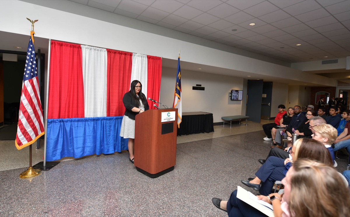 Click to enlarge,  Karmisha Hernandez Luciano, Assistant Director of the Veterans Upward Bound program and U.S. Army veteran, recognized veterans at the CCCC Veterans Day commemoration. 