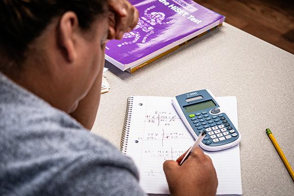 Adult student working on math 