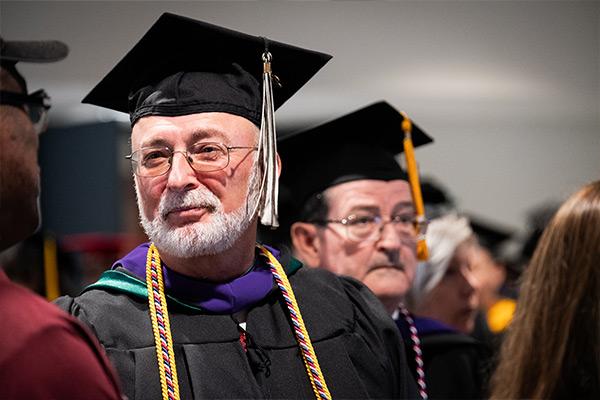 Snapshot of school employees at graduation 