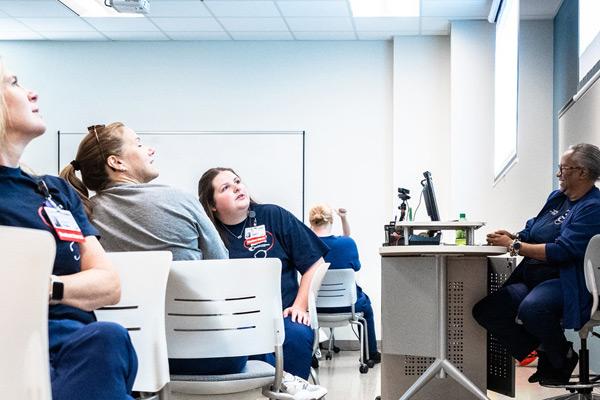 Nursing class looking at instructor 