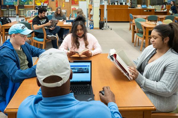 Group of students in library 